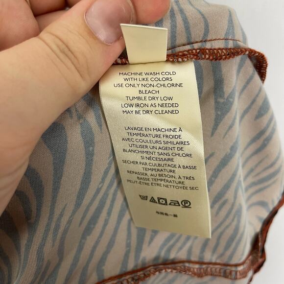 Free People | Tiger Open Back Cut-Out Flouncy Peplum Smocked Long Sleeve Top - Picture 11 of 11